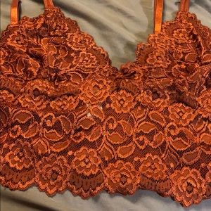 Two pieces Camisole top is XL. Tap pants are 2X.